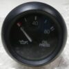 12423150, FMTV Oil Pressure Gauge, 6620-01-527-3326, TACOM 19207-12423150, Oil Pressure Gage, NOS, new take-off from surplus panel, a few scratches may be present. Includes hardware. R1A4
