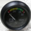 12423154-001, FMTV Voltmeter, DC Volt Gauge, 6625-01-527-3470, TACOM 19207-12423154-001, 20-32 Volts, NOS, new take-off from surplus panel, a few scratches may be present. Includes hardware. R1A4